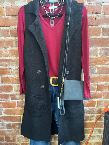 Black sleeveless collar vest