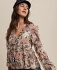 Listicle sheer top